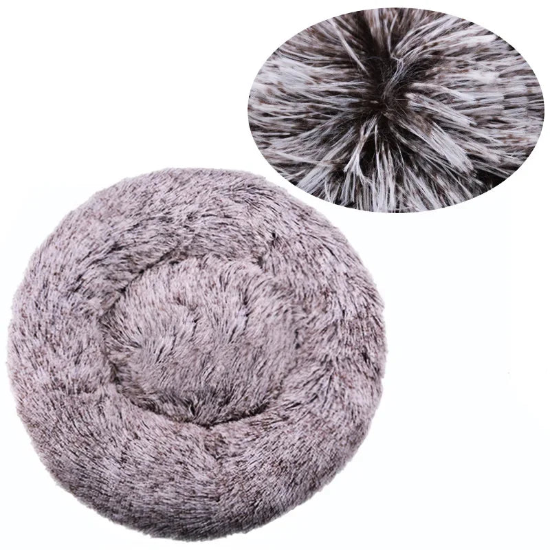Soft plush round pet bed for cats and dogs – warm and comfortable sleeping bed in multiple sizes.