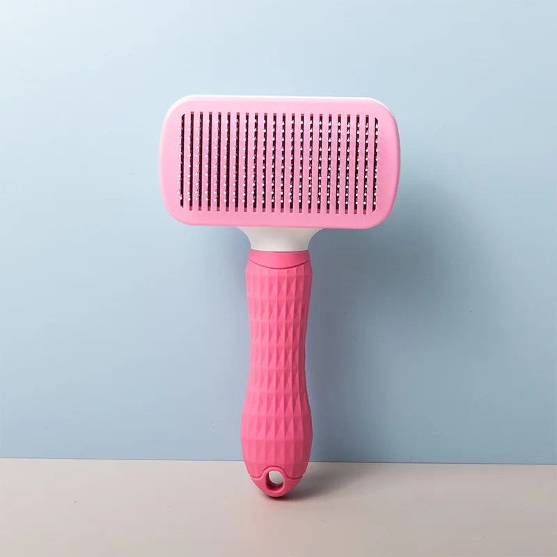 Self-cleaning pet grooming brush for dogs and cats
