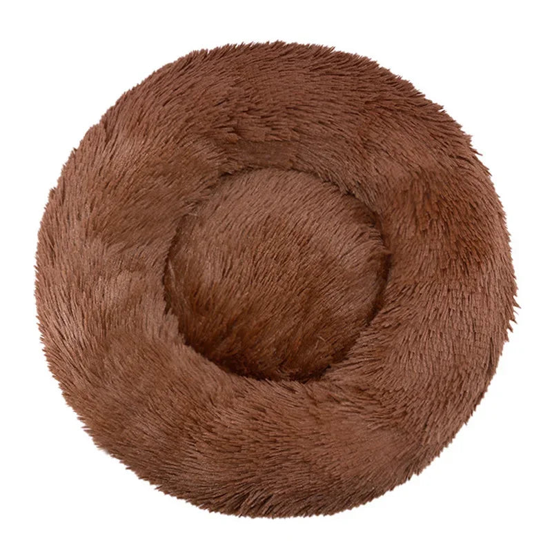 Soft plush round pet bed for cats and dogs – warm and comfortable sleeping bed in multiple sizes.