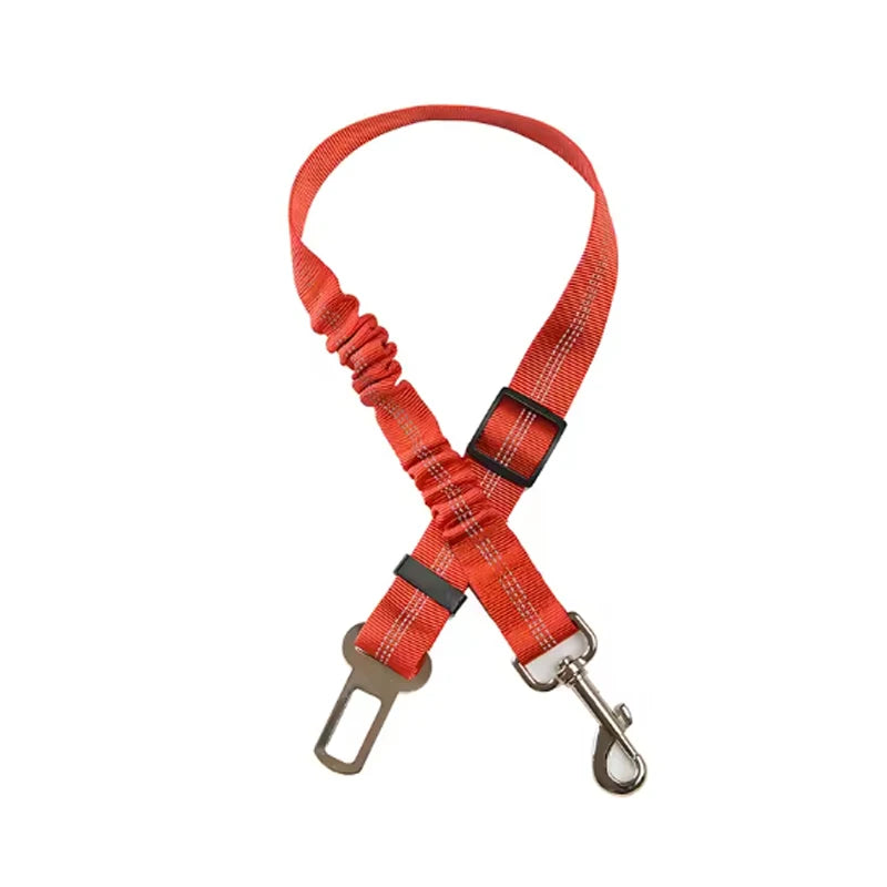Adjustable reflective dog car safety belt with shock-absorbing strap.