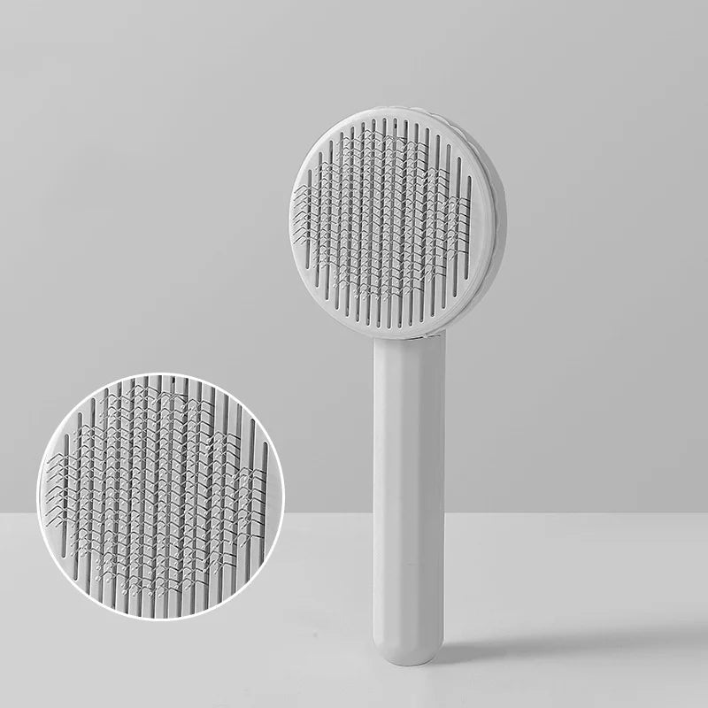 Self-cleaning pet grooming brush for dogs and cats