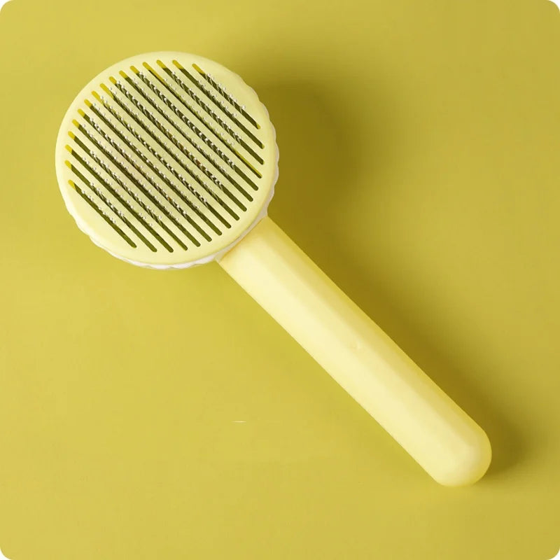 Self-cleaning pet grooming brush for dogs and cats