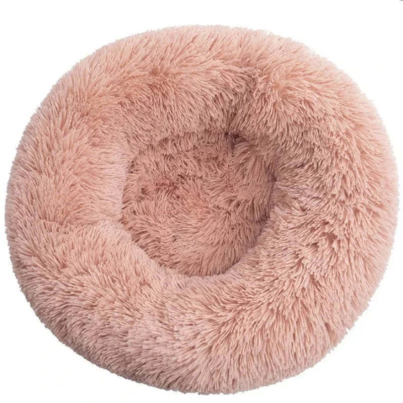 Soft plush round pet bed for cats and dogs – warm and comfortable sleeping bed in multiple sizes.