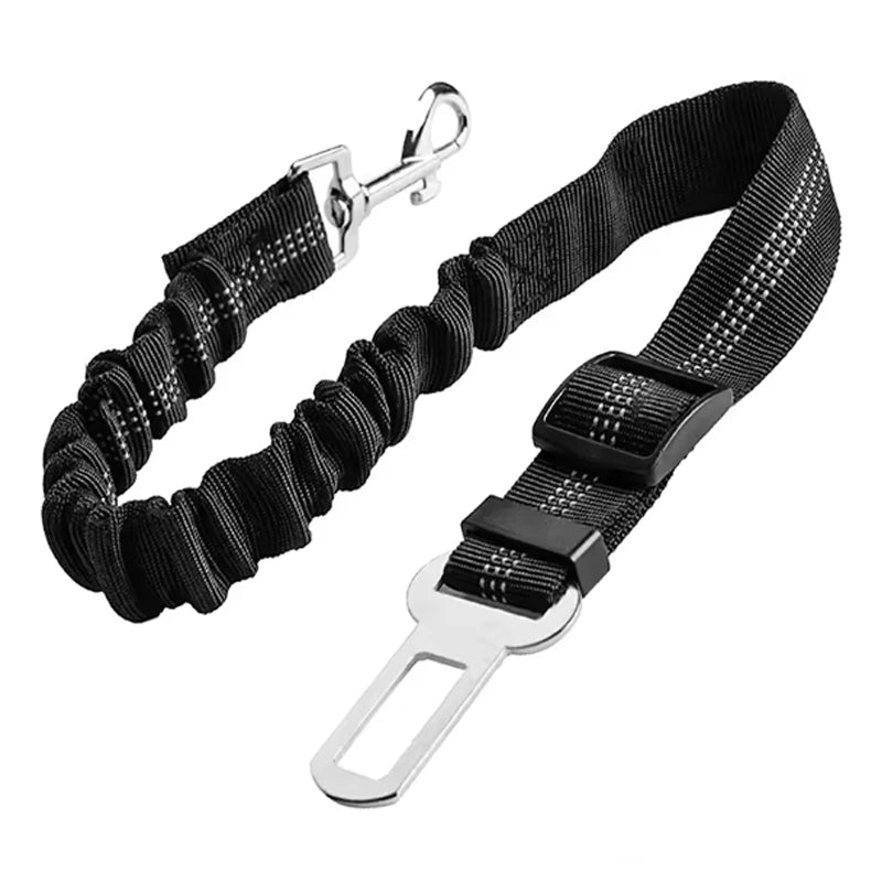 Adjustable reflective dog car safety belt with shock-absorbing strap.