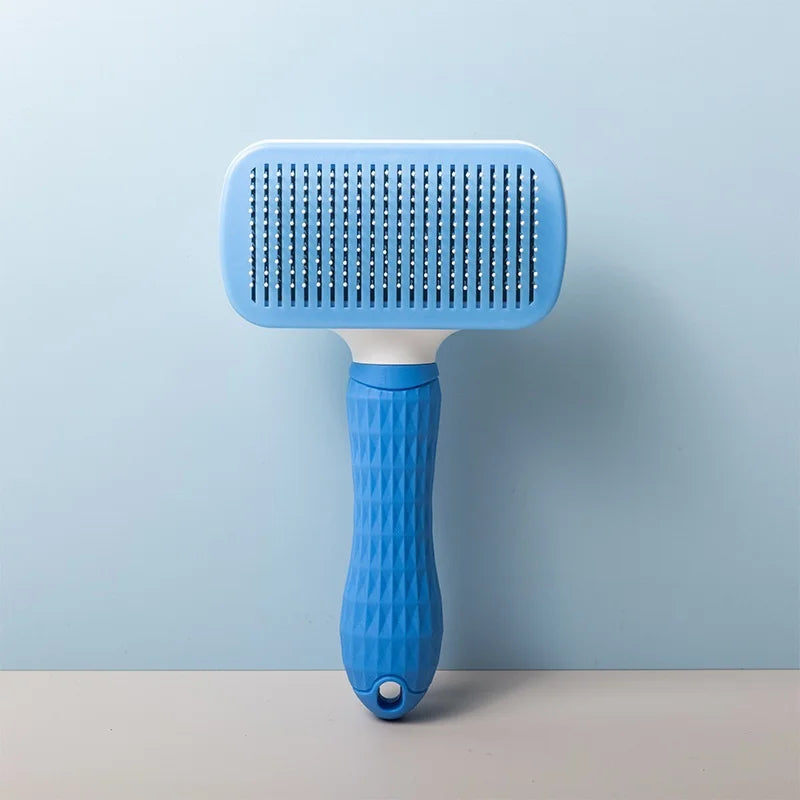 Self-cleaning pet grooming brush for dogs and cats