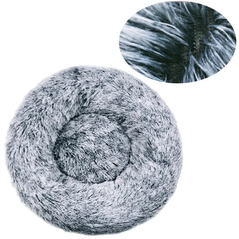 Soft plush round pet bed for cats and dogs – warm and comfortable sleeping bed in multiple sizes.
