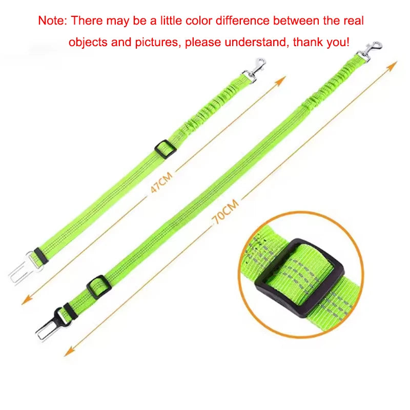Adjustable reflective dog car safety belt with shock-absorbing strap.
