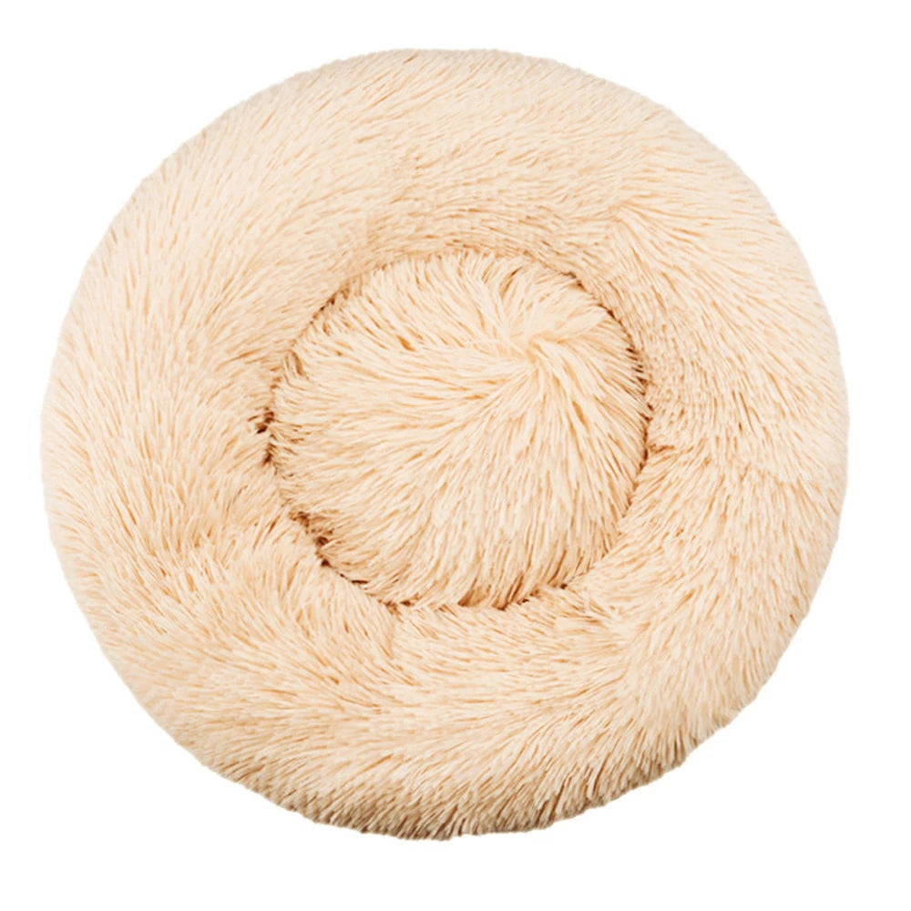 Soft plush round pet bed for cats and dogs – warm and comfortable sleeping bed in multiple sizes.
