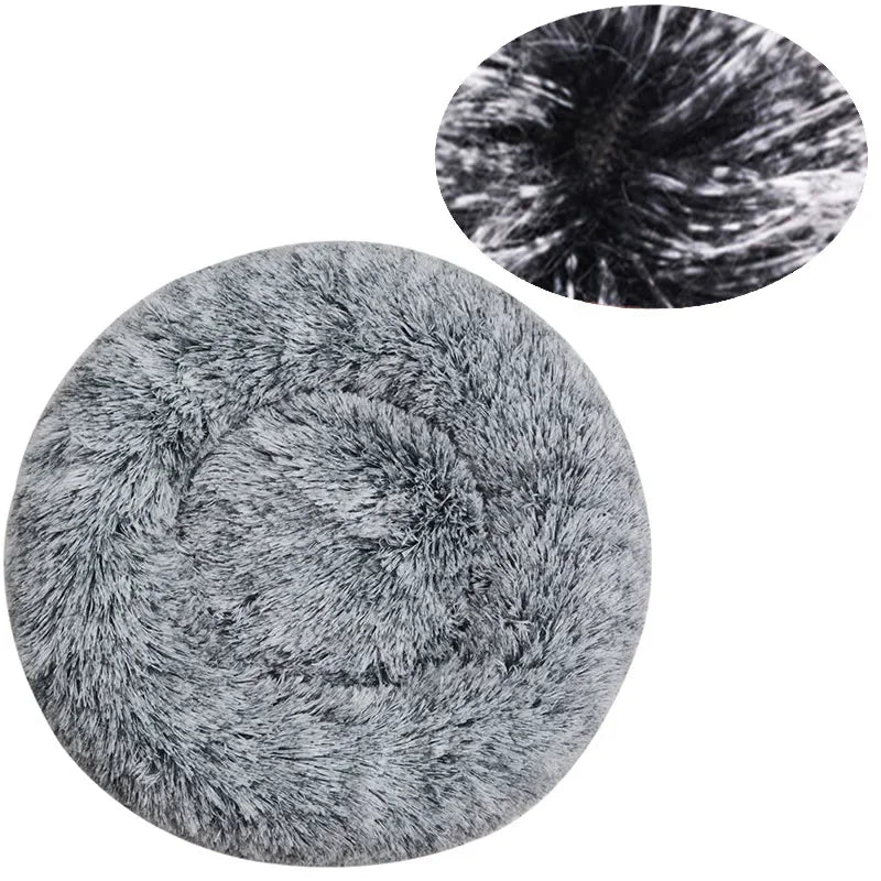 Soft plush round pet bed for cats and dogs – warm and comfortable sleeping bed in multiple sizes.