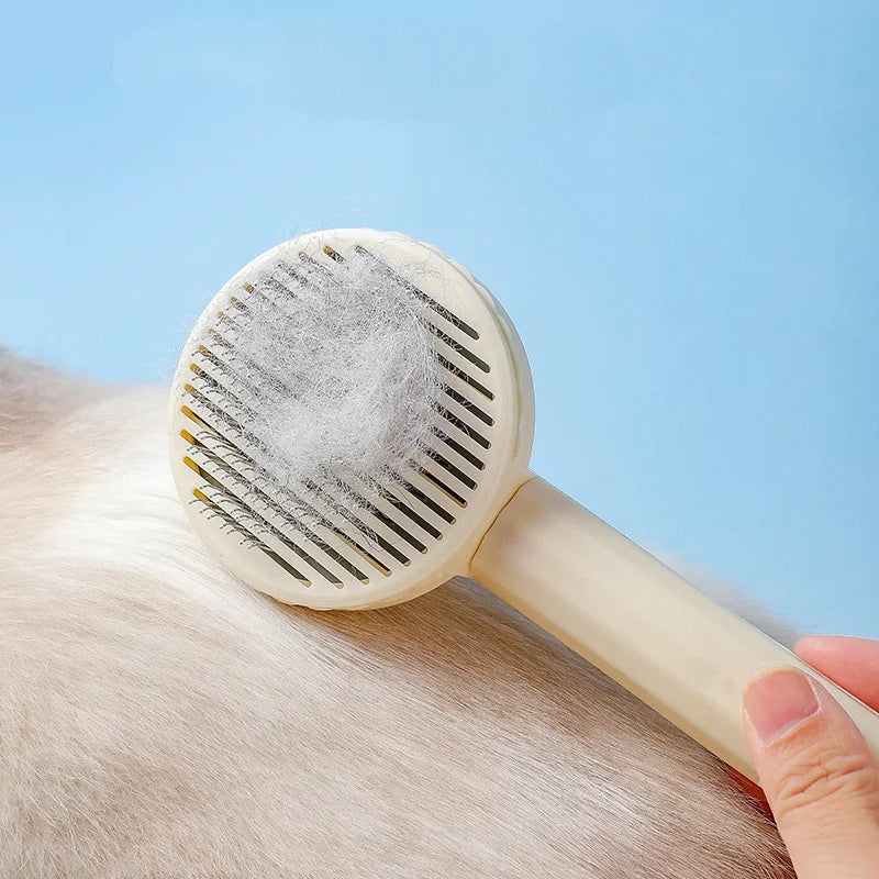 Self-cleaning pet grooming brush for dogs and cats