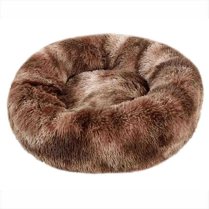 Soft plush round pet bed for cats and dogs – warm and comfortable sleeping bed in multiple sizes.