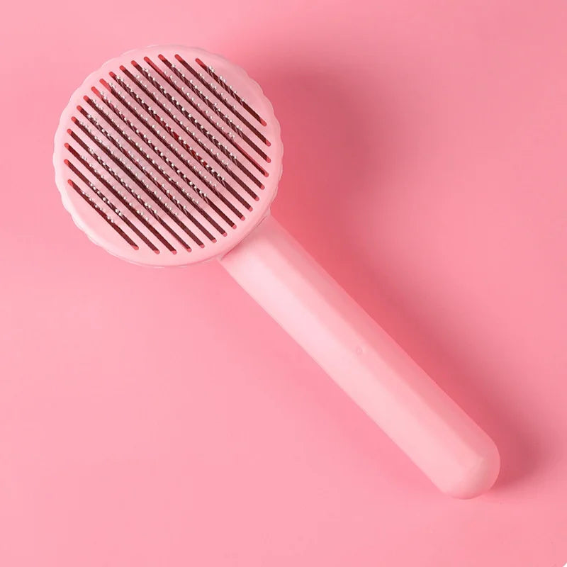 Self-cleaning pet grooming brush for dogs and cats