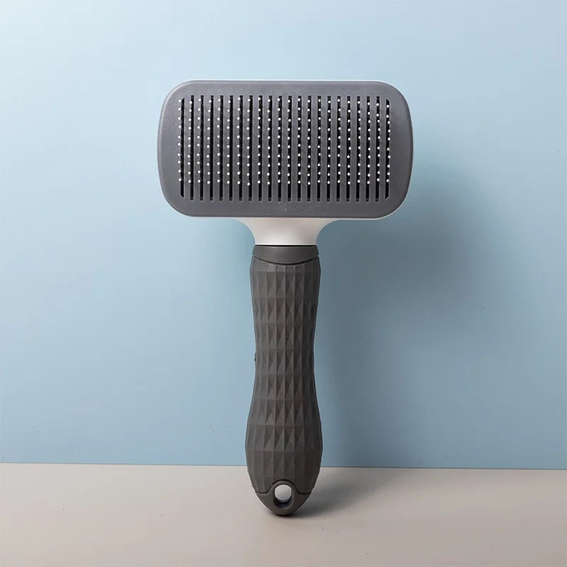 Self-cleaning pet grooming brush for dogs and cats
