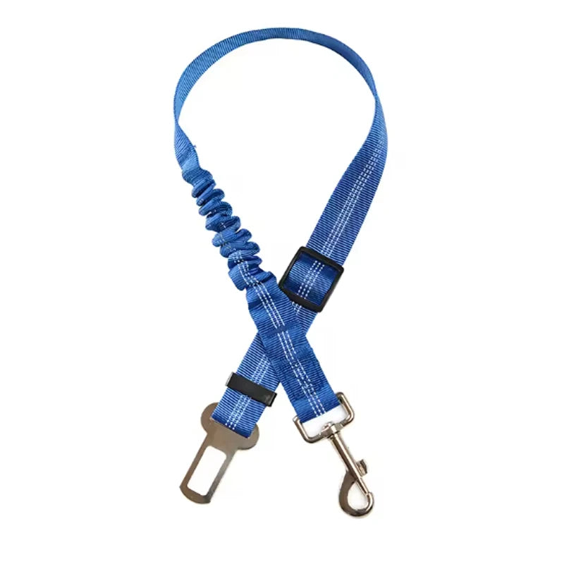 Adjustable reflective dog car safety belt with shock-absorbing strap.