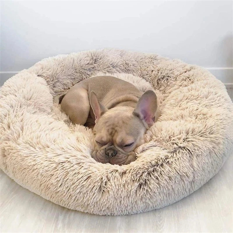 Soft plush round pet bed for cats and dogs – warm and comfortable sleeping bed in multiple sizes.